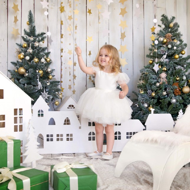 Little girl with christmas tree